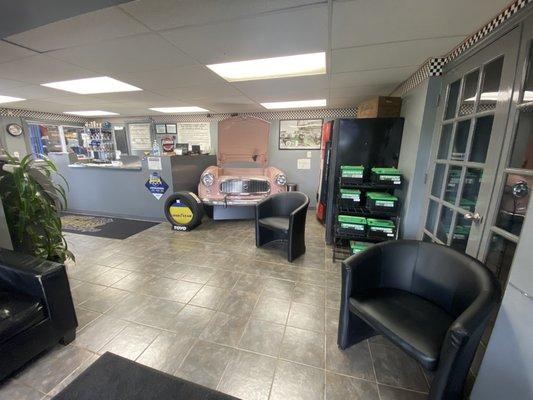 Front desk, vending machine, soda machine, and to the right is the bathroom