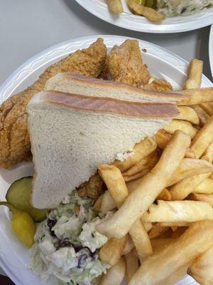 Catfish fillet dinner with 4 fillets, fries and coleslaw.