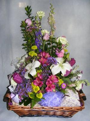 Custom design of fresh flowers and pamper products delivered on Administrative Professionals Day