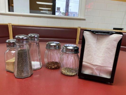 Table top condiments options and napkin holder