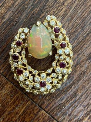 One of a kind custom-made 18-karat gold ruby diamond opal pendant pin, customers received compliments once she put it on.