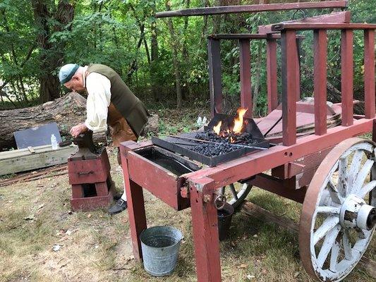 Blacksmith at work.