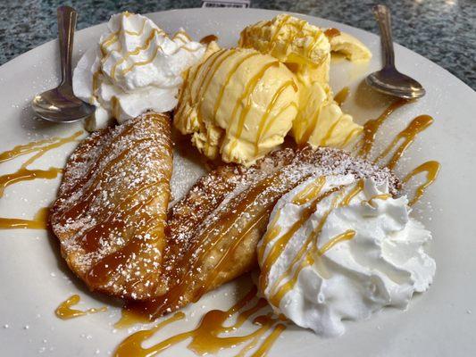 2 Apple empanada with French vanilla ice cream and whip cream