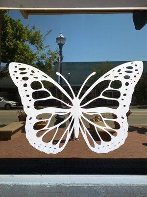 Butterfly backdrop on one of the large windows