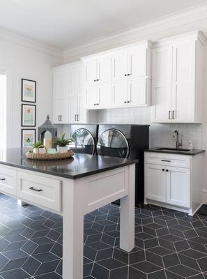 Black & White Laundry Room with Patterned Tile