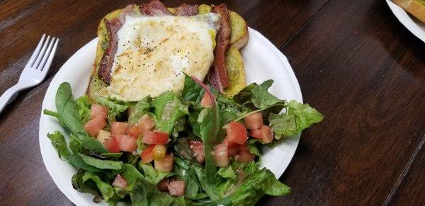 Bacon and egg avocado toastie with fresh greens. Yummy!