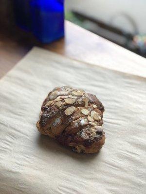 Coconut Peanut Butter + Cherry Chai Jam on an Almond Croissant