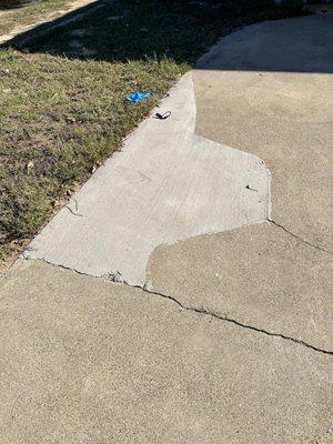 Repair from the busted concrete in the driveway