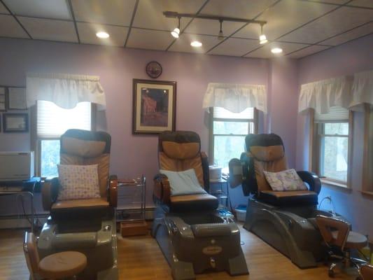 There are 6 pedicure massage chairs