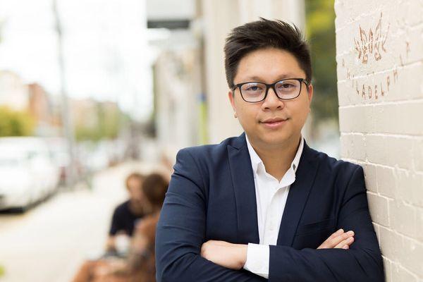 Friendly headshot outside cafe