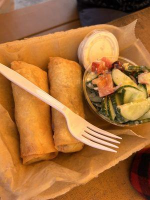 Mashed potato egg rolls and cucumber peach salad