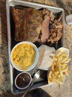 Ribs, Sliced Beef Brisket & Pulled Pork called Smokehouse Combo 2. Macaroni & Cheese, French Fries and Homemade Sweet Cornbread