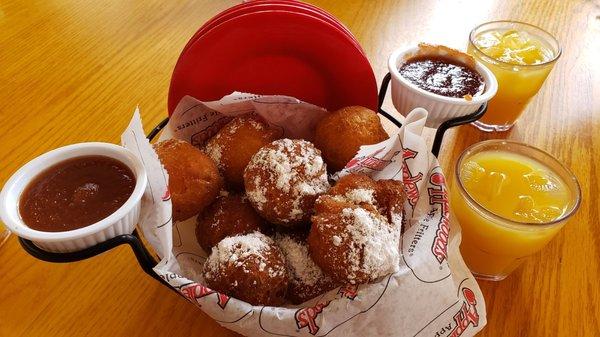 Complimentary basket of apple hush puppies and pineapple apple juice