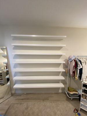 IKEA lack floating shelves perfect for displaying your favorite shoes and bags collection.