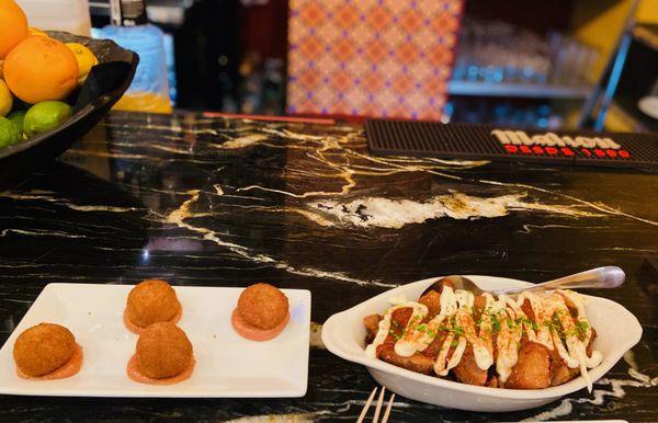 Croquetas and patatas bravas.