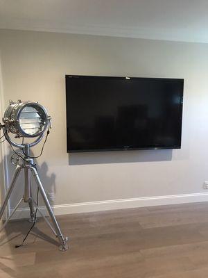 70 inch Television installed and wall mounted with all wires concealed for a client and Calabasas, CA.