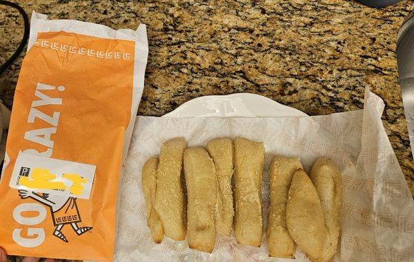 They have the mini crazy breads! Bag next to bread for reference to how long the breadsticks are advertised as being.