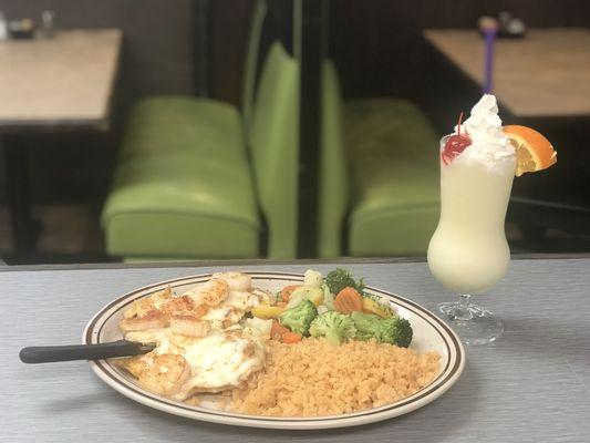 Pollo con Camarones and Piña Colada.