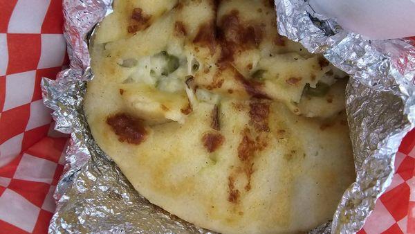 Cheese and jalapeño pupusa. Yummy!