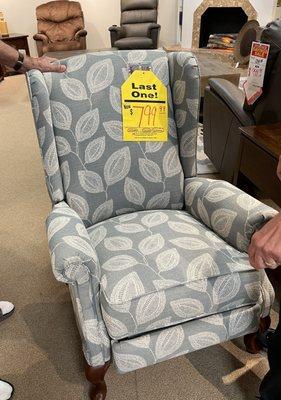 Pretty chair with push back recliner.