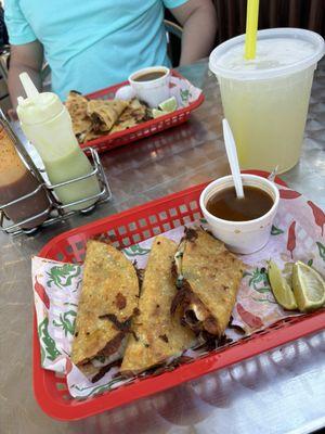 Quesabirria tacos and a lemonade