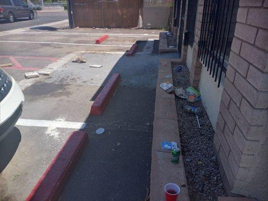 Garbage and debris in the parking lot 8/7/2021