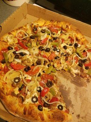 Their $14 Fiesta pizza which is like a supreme with tons of peppers, onions, mushrooms, sausage, meatball, pepperoni, black olives.