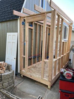 Add on bathroom to tuff shed