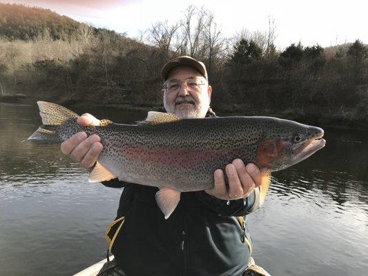 Larry and one of the countless fish we catch every year over 10 lbs