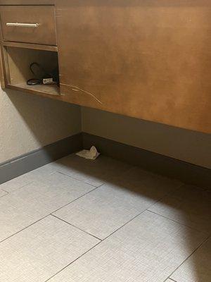 Used tissues under the sink