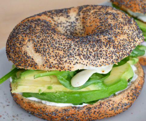 Sesame bagel with avocado and cream cheese