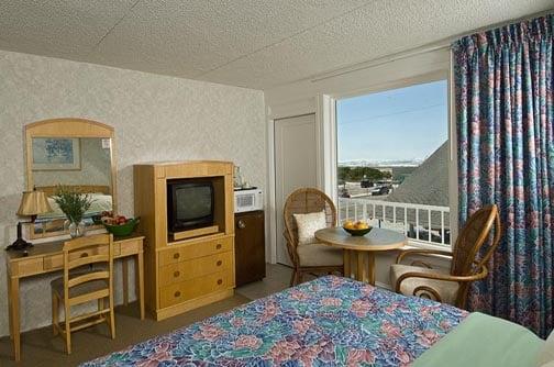 Type C room. Includes a private balcony, king size bed, coffee maker,and  updated bathroom.