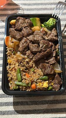 Filet Mignon with fried rice and veggies. Amazing, made with love.