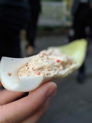 Wedding cocktail hour catering on the Out on a Limb Tree Canopy Walk. Endive, shrimp and crab salad.