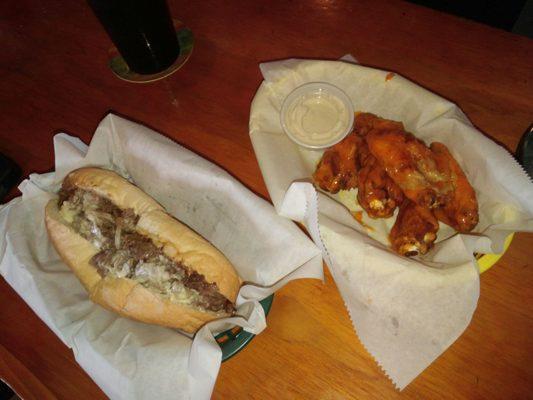 Regular cheesesteak and 5 medium wings. Everything was cooked perfect. Good lunch!