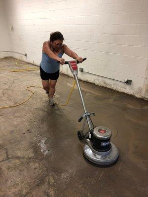 Here's my wife using the floor sander we rented from Ace!