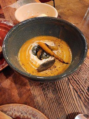 kabocha squash bisque, brown butter carrot, pistou, creme fraiche