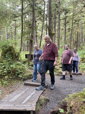 Duane helping our injured person navigate the trail.