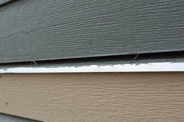 Old caulk left on re used siding