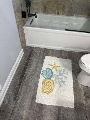 Guest bathroom - tile floor and shower