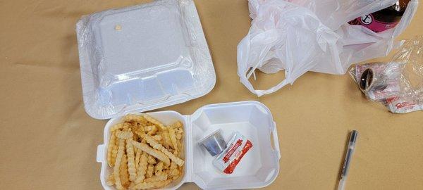 Large jerk chicken and small fries. The come unsalted. Sauce sides are 1oz instead of 3oz.