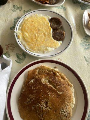 Pecan pancakes, cheese grits & sausage patties.