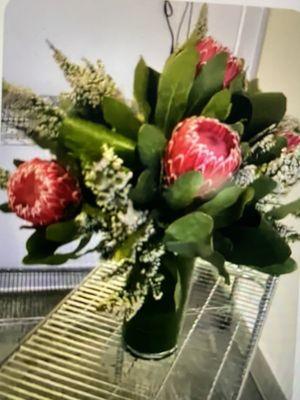 Empress Protea, heather and banana leaves make for a gorgeous Birthday bouquet! Thank you Jose for an outstanding job!!!