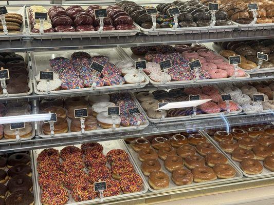 Different kinds of donuts for sale.