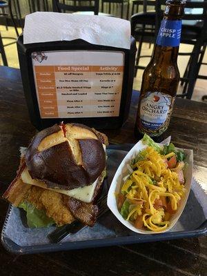 Custom crispy chicken, bacon, pepper jack on a pretzel bun with side salad!