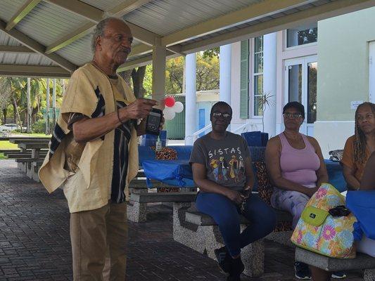 Ray Fauntroy shares an original song at Raining Deer's birthday celebration, 2024.