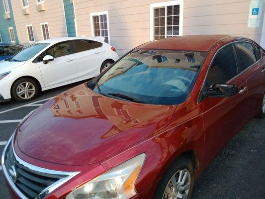 Employee Dwight's personal car in his personal space who is not handicapped. Note the parking sign.