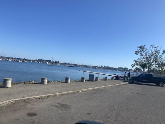 View looking from the rowing club parking lot down the lake Merritt channel to the estuary and docs