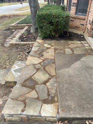 Pavers at top of resting wall added based on materials we already had on our property