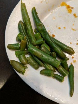 Green beans are just that... GREEN. The ones served here are two-tone... Brown and green.